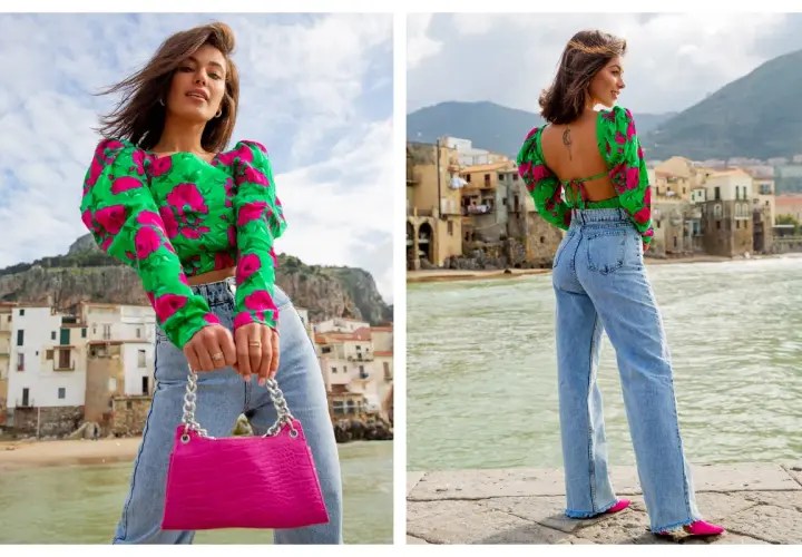 Włoski styl: crop top w kwiaty, jeansy z wysokim stanem i fuksjowa torebka. Tak ubierają się włoszki, czując się swobodnie i stylowo nad morzem.