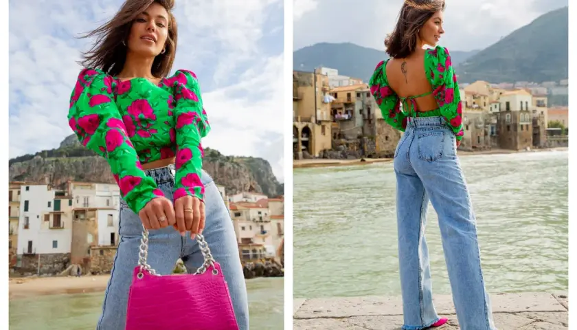 Włoski styl: crop top w kwiaty, jeansy z wysokim stanem i fuksjowa torebka. Tak ubierają się włoszki, czując się swobodnie i stylowo nad morzem.