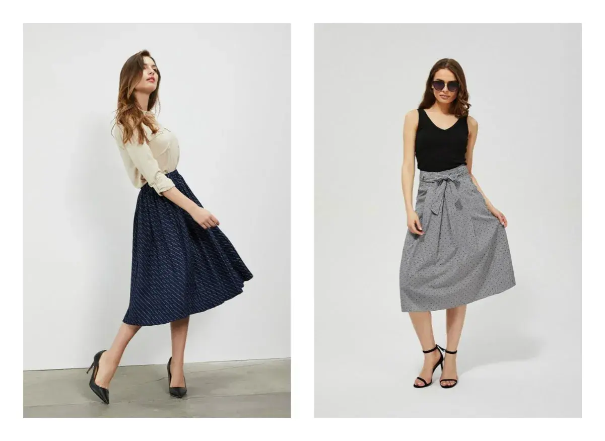 Dwie kobiety prezentują eleganckie spódnice midi. Odpowiedź na pytanie: dress code co to?