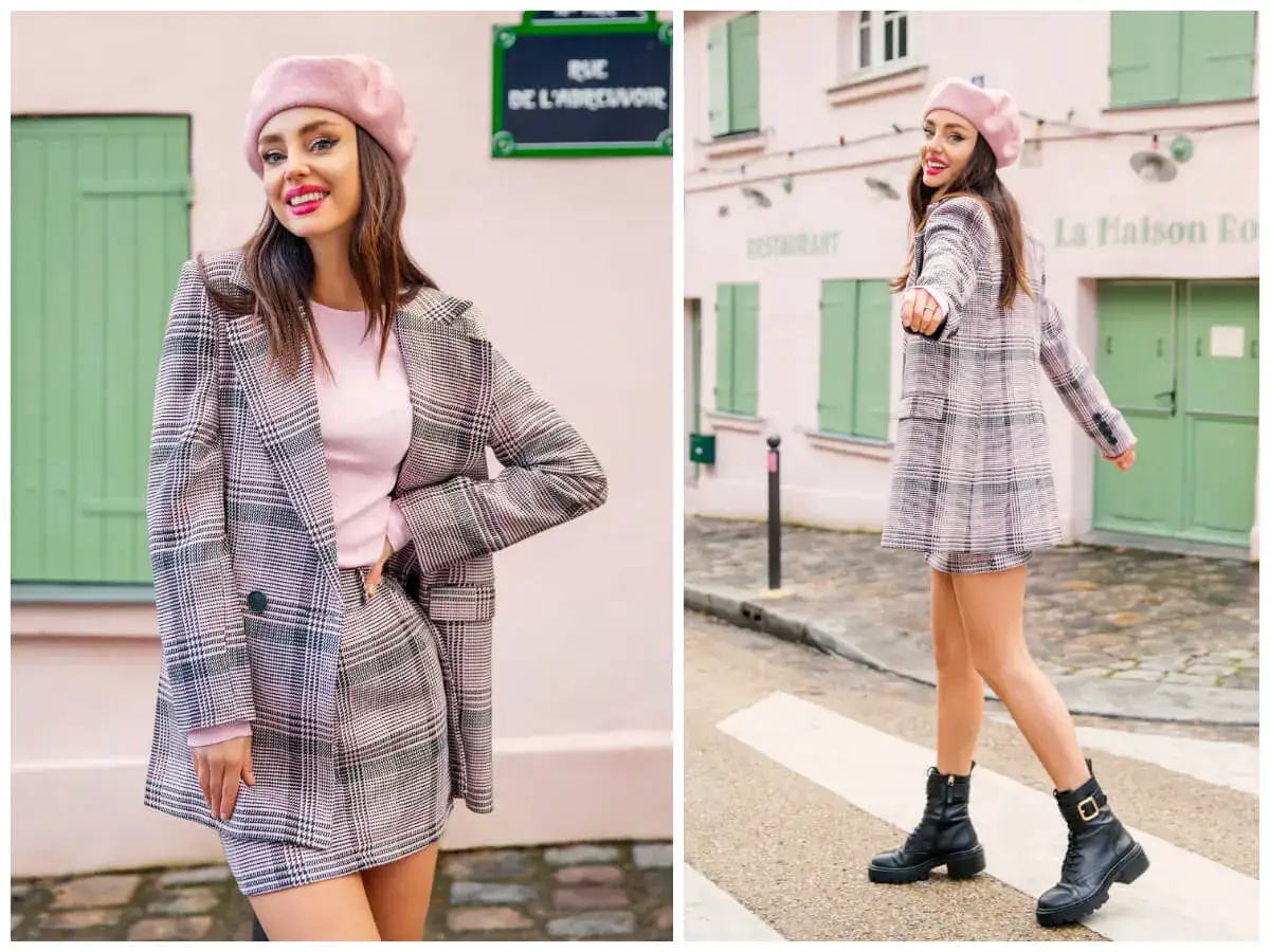 Dziewczyna w różowym beretku i kraciastej marynarce z mini spódniczką, prezentująca styl preppy.